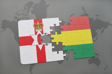 puzzle with the national flag of northern ireland and bolivia on a world map