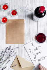 concept Valentine's Day love letter wooden background top view