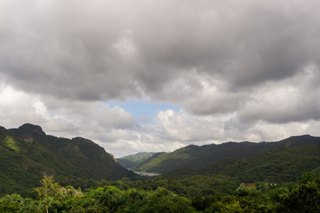 The view is beautiful landscape of green hills in Cuba