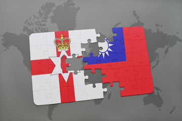 puzzle with the national flag of northern ireland and taiwan on a world map