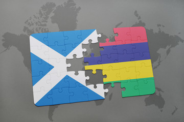 puzzle with the national flag of scotland and mauritius on a world map