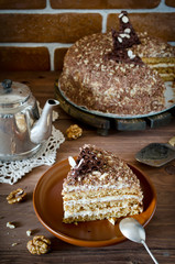 Honey cake with walnuts and grated chocolate
