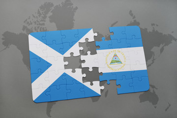 puzzle with the national flag of scotland and nicaragua on a world map