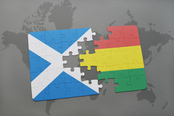 puzzle with the national flag of scotland and bolivia on a world map