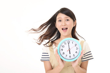 時計を持つ女性