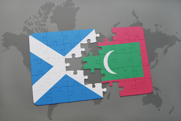 puzzle with the national flag of scotland and maldives on a world map