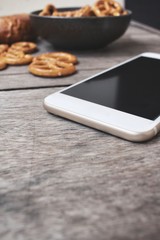 Pretzels with smart phone