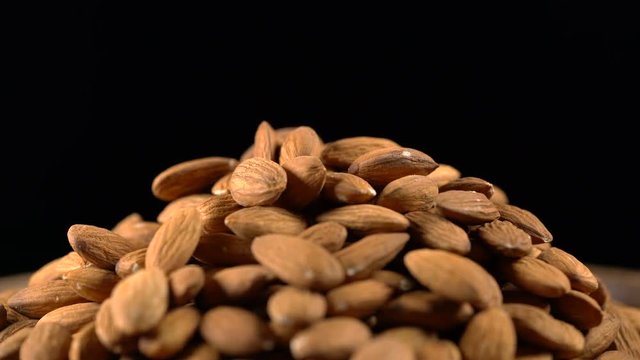 almond rotates on a black background