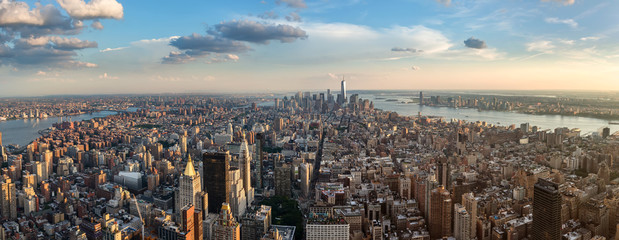 New York Manhattan - Skyline Panorama wide angle NYC afternoon cityscape panoramic view manhattan downtown moody sky mood early evening cloudy sky inner city rooftops early morning morningshot clouds