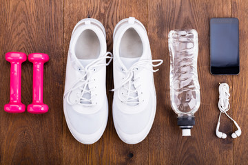 Exercise Equipment On Wooden Floor