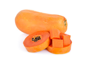 whole and cut ripe papaya on white background