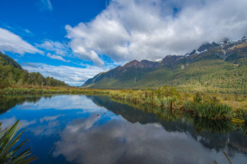 Fototapeta na wymiar lake like mirror reflect sky cloud and mountain