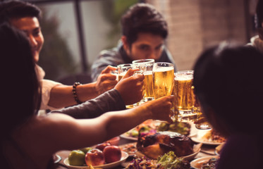 People in asian are celebrating the festival they clink glasses
