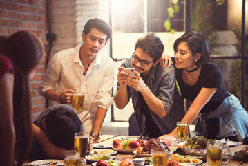  Group of friends taking pictures people who are intoxicated fro