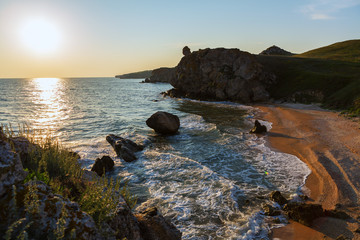 Sun rises over the Sea of Azov on Generals beach. Karalar regional landscape park in Crimea.