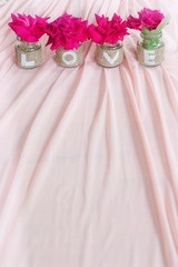 Love on the bottle with red rose for Valentine's day or wedding background