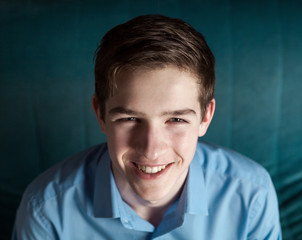 Portrait of handsome young man, indoor