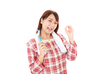 Obraz premium 歯磨きをする女性 