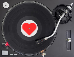 Turntable Playing Romantic Melody Record, Shape of Heart Label, Top View