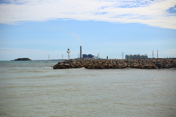 Rock breakwater and Blue sky in Rayong at Thailand