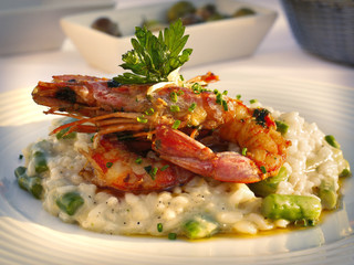  Italian Cuisine. Large shrimp with rice and herbs
