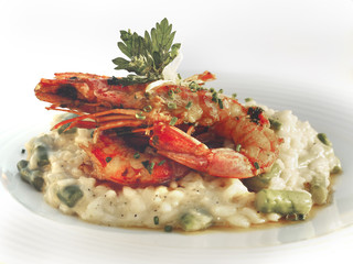  Italian Cuisine. Large shrimp with rice and herbs