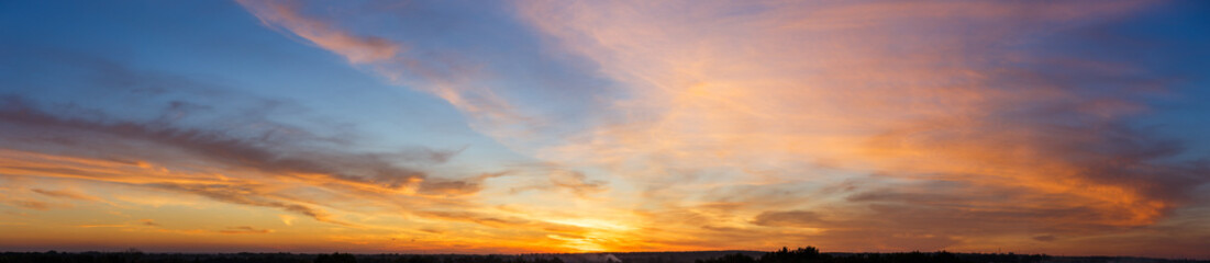 Fototapeta Beautiful sunset sky with amazing colorful clouds against deep blue obraz