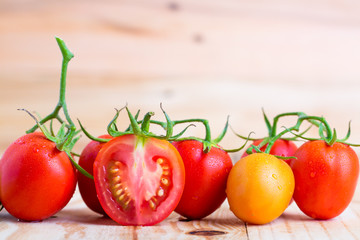 fresh tomato on wooden background