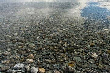 Stones through shallow water - 133175021