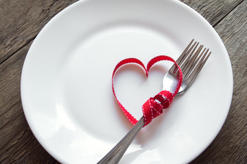 Table setting with red heart