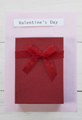 Square shaped Valentines gift under adhesive note