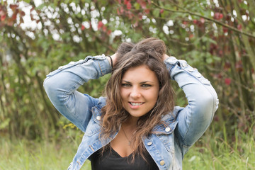 Cool smiling teenage girl outdoors