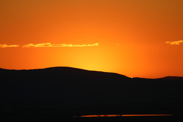 Thin Clouds, Orange Skies