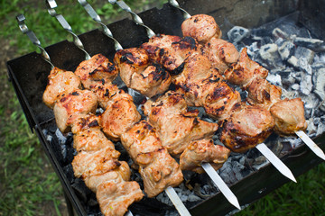 Beef and pork barbecue, steak on the grill. Kebab on a skewer. N