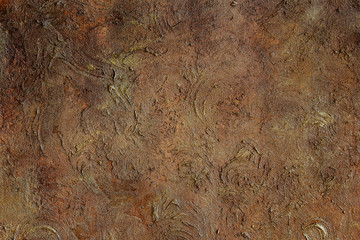 Brown grunge scratched wall texture as a background.