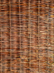 The panel is made of braided vines. Texture