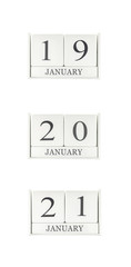 Closeup group of white wooden calendar with black 19 , 20 , 21 january word , three date calendar isolated on white background