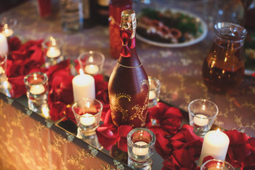 Cutlery and glasses. Dinner in the restaurant. Candles on the ta