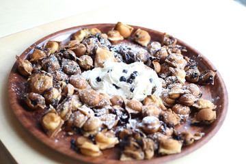 Sweet tasty dessert waffles with berries