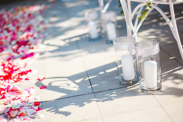 Wedding ceremony outdoors. Wedding arch in white with fresh flow