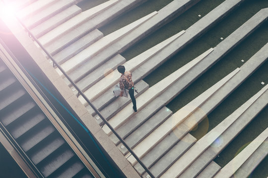 Man walking  motion blurred  with flare light and fade tone

