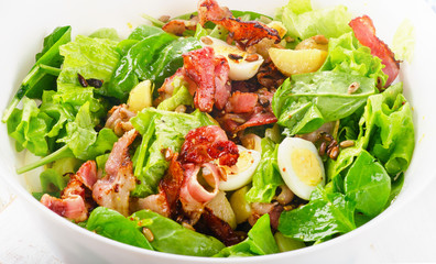 Warm salad with bacon and potatoes.