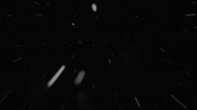 Heavy wet snow falling looking up or forward driving plate (4K). 
Camera facing up or tracking forward. Use with blending mode (add or screen) to remove black or use as matte. S1/50 for motion blur. 