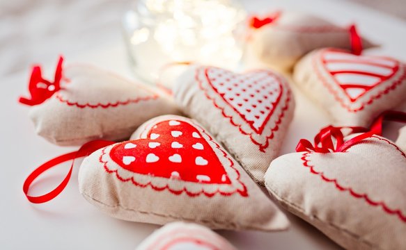 Fabric hearts on white background