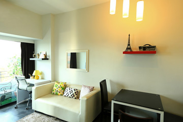 Interior design of room with furniture. Comfortable with bed, sofa, 
chairs, standing lamp, small table