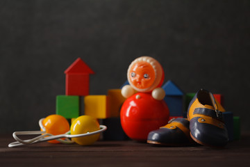 construction from wooden blocks with ugly toy