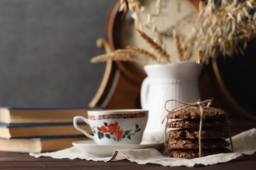 evening relax tea drinking with book. Concept