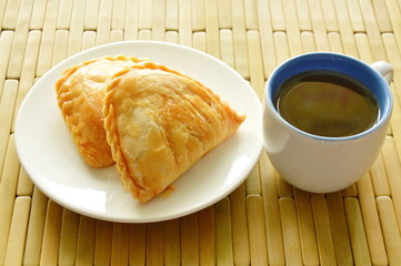 curry pie stuffed chicken and bean eat couple with hot tea