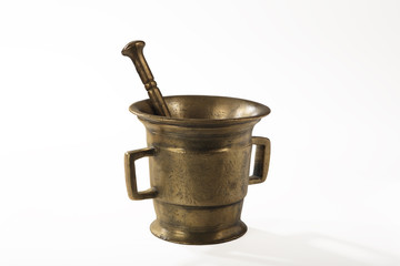 Old cast bronze mortar with pestle on white background. For your design