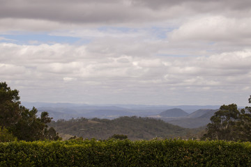 Over the Hedge. A view of the Lockyer Valley in Queensland Australia, from the top of the range near Toowoomba, looking out over Postman's Ridge and the national park. 